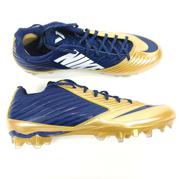 gold and white nike football cleats
